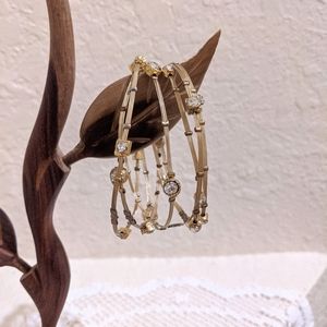 Seasonal Whispers clear and gold bracelets